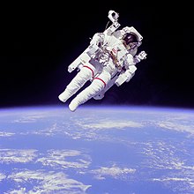 Why are astronauts weightless in space?