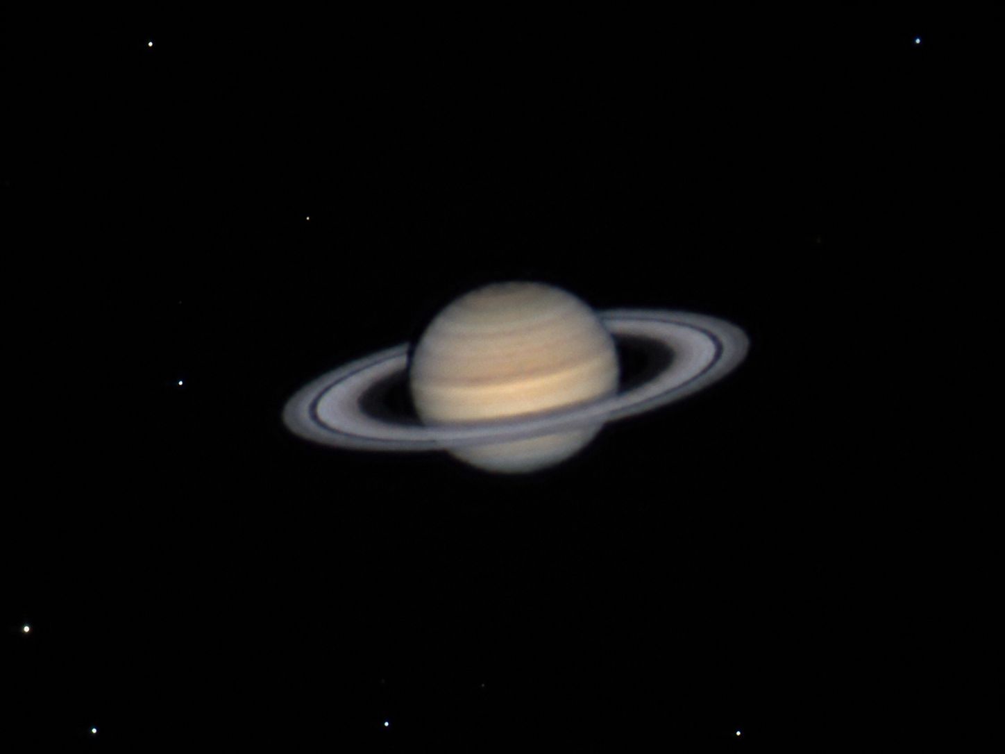 Saturn as it appears through a back-garden telescope, with the rings clearly visible