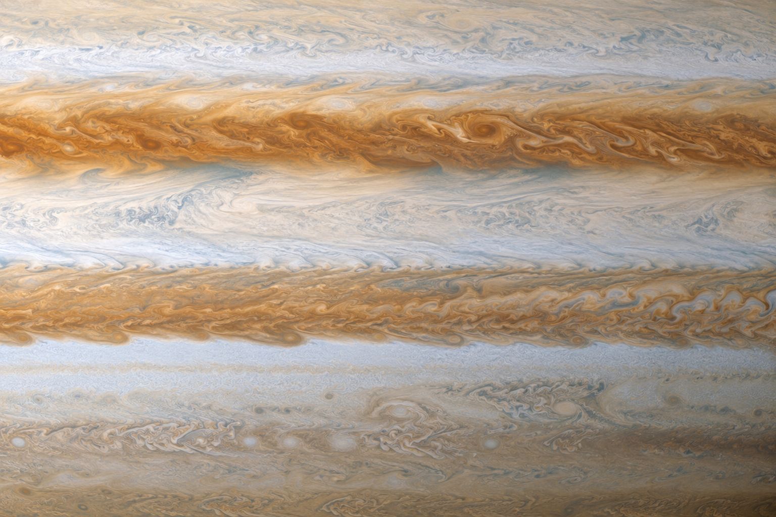 Close-up of Saturn's swirling cloud bands, showing the alternating zones and belts in detail