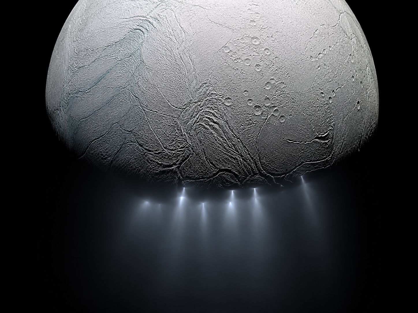 Saturn's moon Enceladus showing white geysers shooting from its south pole, photographed by Cassini