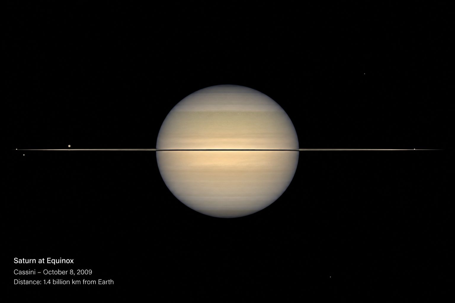 Saturn at equinox with rings edge-on, photographed by Cassini in 2009